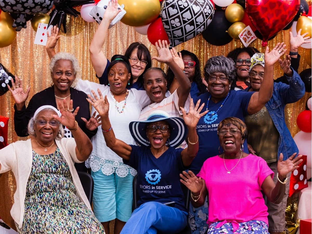 Seniors in Service volunteers celebrate together during the “Lucky to Have You” volunteer appreciation event in Tampa Bay.